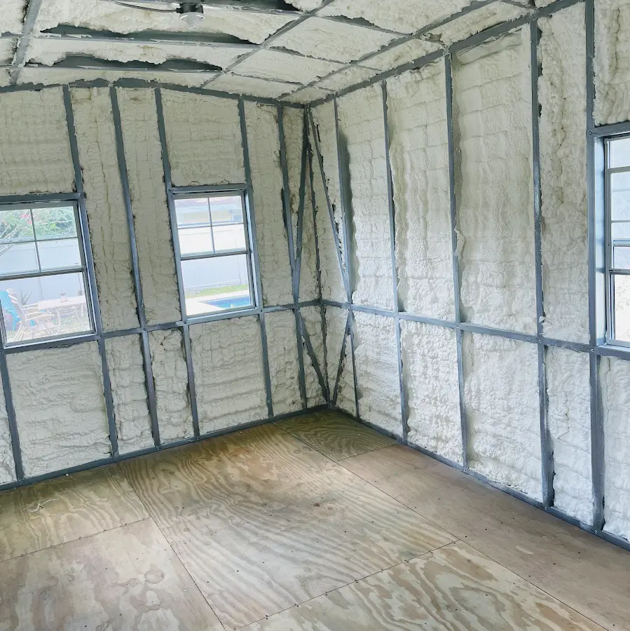 Closed-cell spray foam insulation applied to wall cavities in a residential project in Sun Prairie